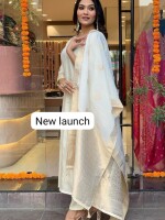 Pure dola silk kurta with exquisite handwork on neck and sleeves, paired with pants & banarasi dupatta