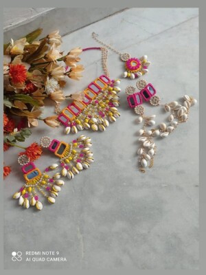 Handmade mirrorwork Pink and Yellow Necklace set with the lustrous pearls, dazzling beads, and iridescent shells