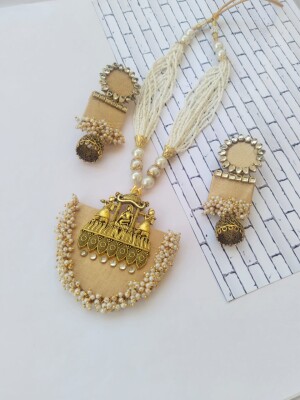 Pastel yellow, beige, and golden beads necklace earrings set