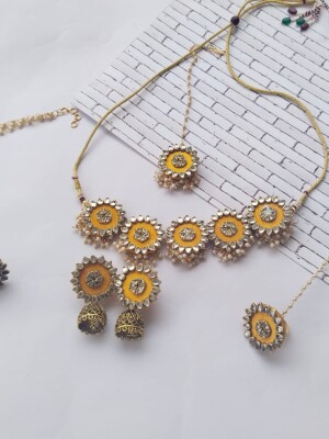 Haldi special light yellow kundan neckline with earrings tika bracelet jewlry set