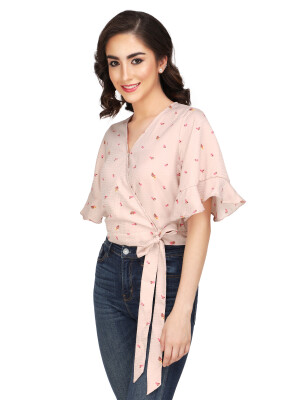 Asymmetrical Pink Floral Crop Top,with ruffle sleeves and elasticized hemline and non functional tie knot for grace.