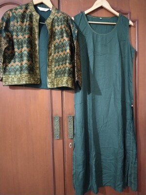 Biba Plain sleeveless kurta  paired with a printed shrug in Bust size 40