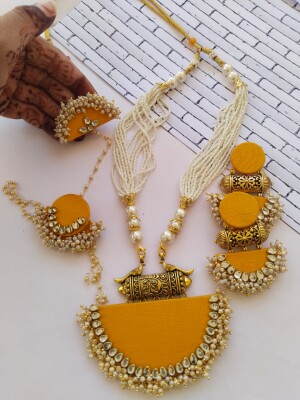 Rainvas Bright yellow and golden necklace earrings bracelet tika set