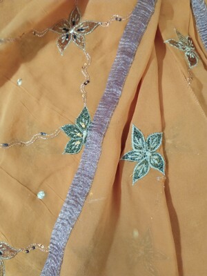 Pure Georgette mustard saree with work all over in