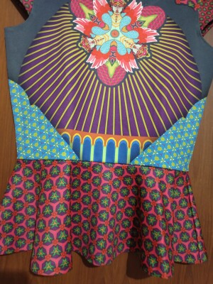 Egyption print '  full stretchable '  peplum top from designer Siddhartha Bansal in multicolour