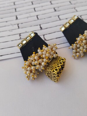 Rainvas Black and golden beaded jhumka earrings