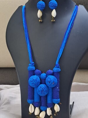 Exclusive handmade blue thread necklace with earrings.
