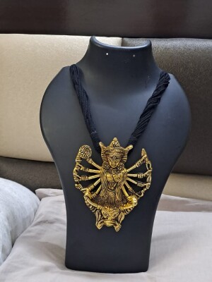 Thread necklace with oxidised golden durga pendant Necklace