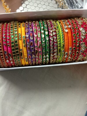 Exclusive,Handmade, multicoloured, silk thread bangles with Kundan for wedding and festive season.