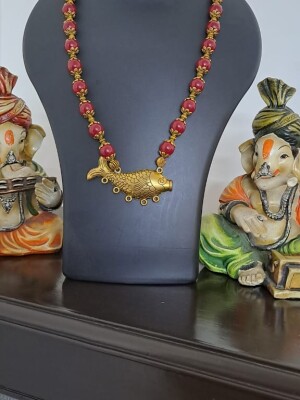 Exclusive Red Glass neckline with Golden oxidised  fish pendant and matching earrings