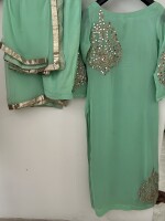 Neon green, georgette suit with golden mirror Work on the front and back .