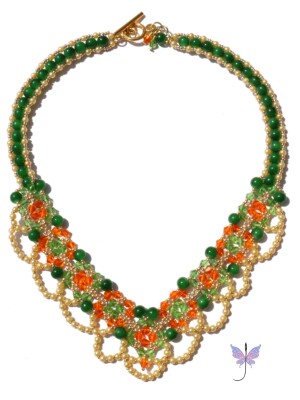 Handcrafted beaded, Jade and Biconic Necklace, using peridot green and orange bicones, bottle green glass jade beads and cream pearls