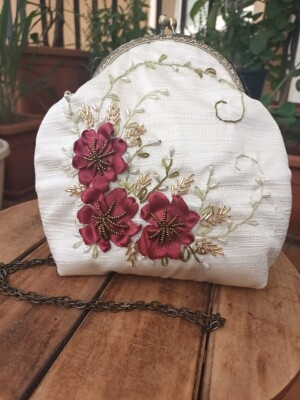 embroidered Clutch in different colours by Ava Embroidery