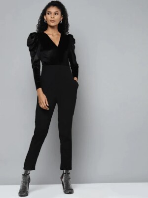 Women Black puff shoulder jumpsuit,  a versatile and chic addition to your wardrobe that effortlessly combines style and comfort.