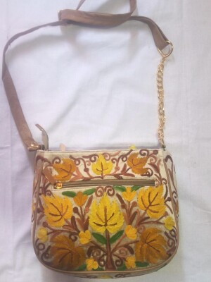Sweed beige leather bag with Kashmiri hand embroidery half chain string