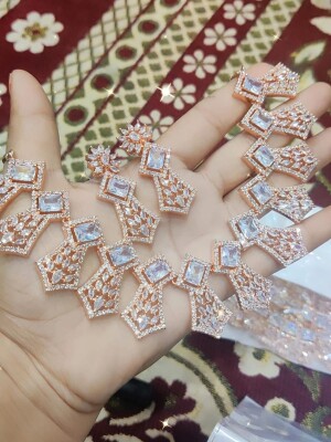 Rose gold plated ,Elegant beautiful necklace set designed with AD and C Z stones. Material: Brass,