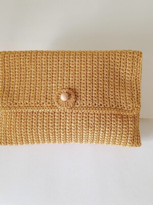 Trendy, bag ,crocheted with cotton yarn and lined inside with cotton cloth.