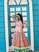 An Anarkali kurta Garara suit set is a traditional Indian ethnic outfit that consists of the Anarkali kurta, Garara bottoms, & the dupatta