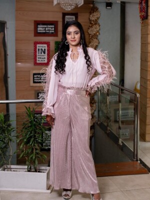 Crushed blush pink and silver shimmer high-waist palazzo pants, reflecting a contemporary and stylish design.