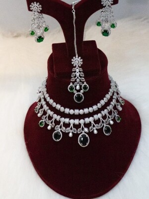 Ultimate bridal micro zirconia stones, fine AD, and pearl ensemble with maang tikka, earrings, & medium choker
